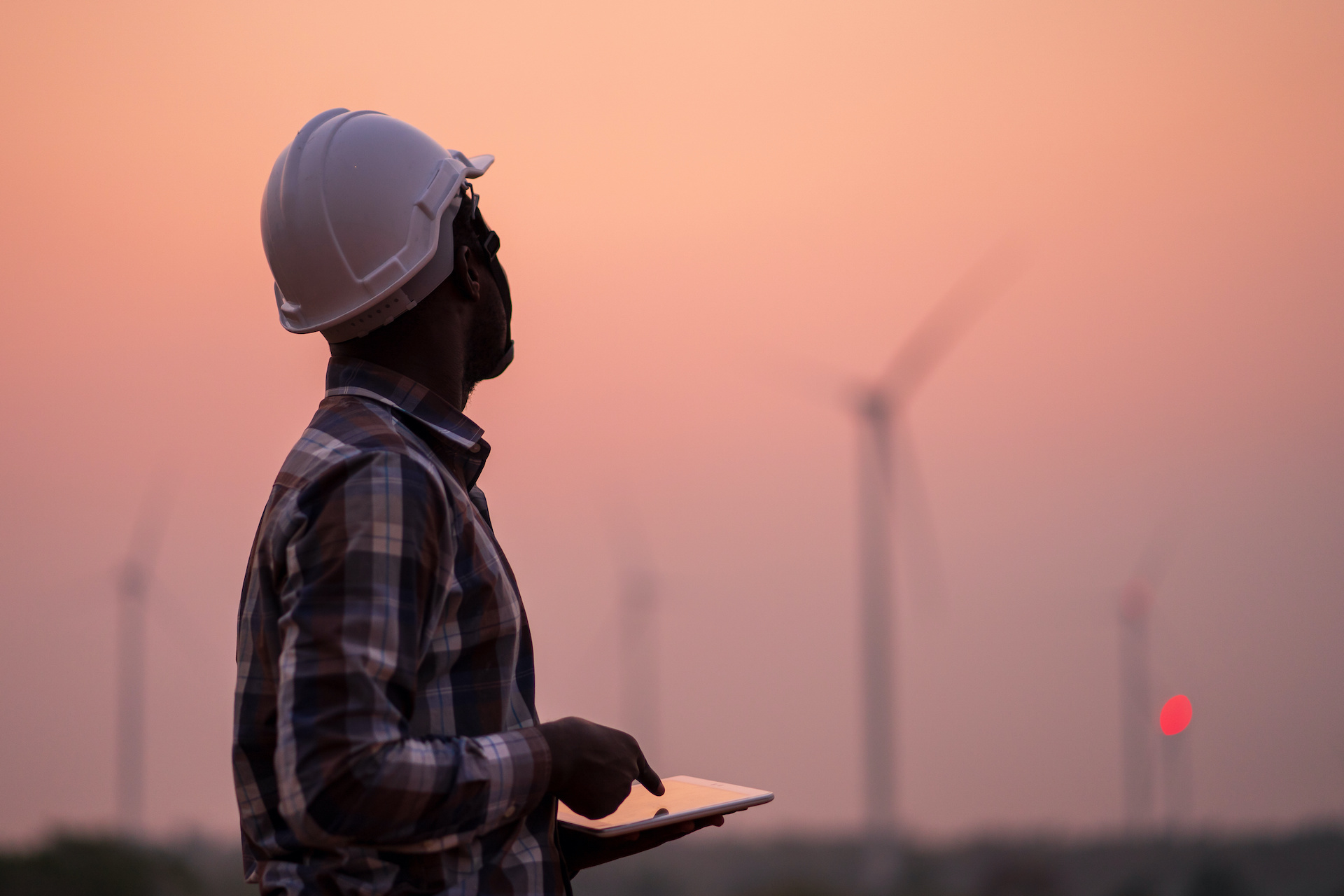 Technician at sunrise