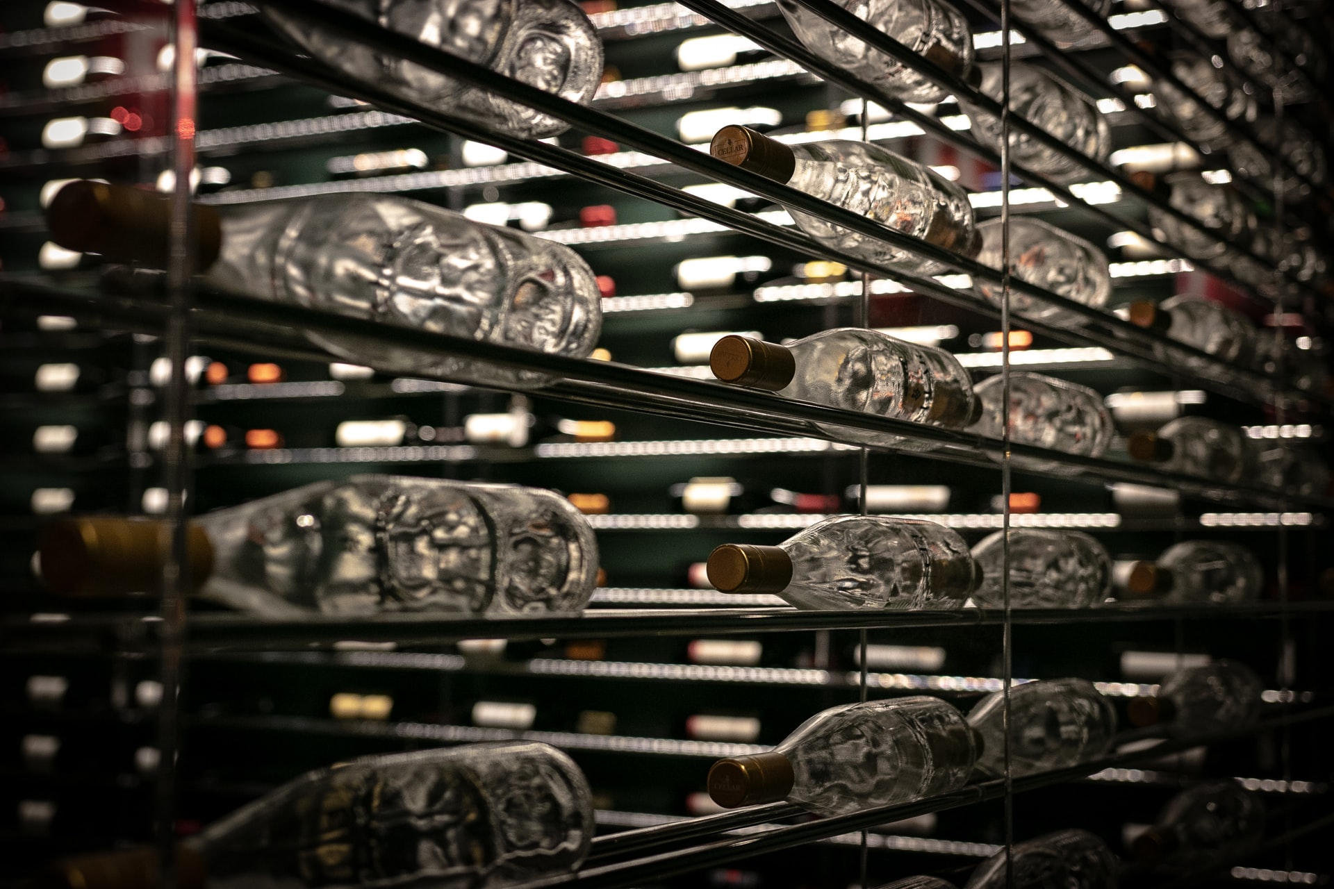 Rows of shelved wine bottles